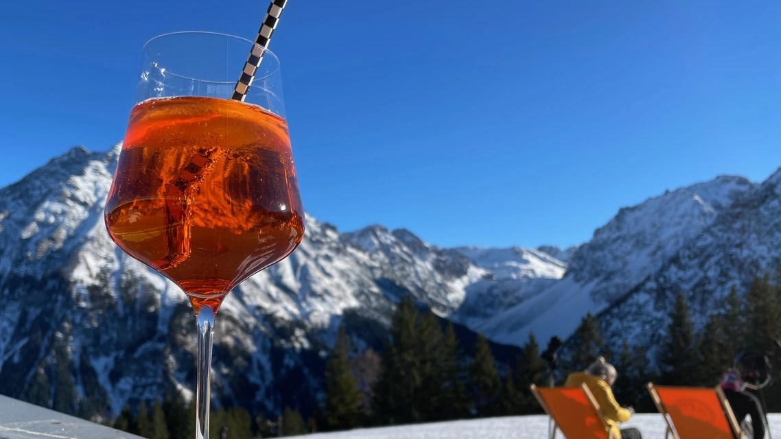 Apres-ski drink in Austrian Alps. Vorarlberg, Austria.