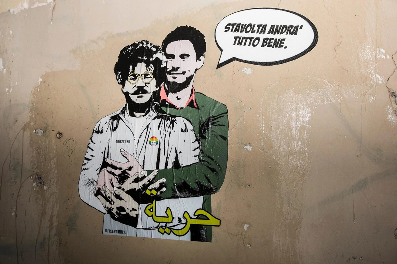 Roma, un murales con Zaki e Regeni vicino all'ambasciata egiziana (Ansa)