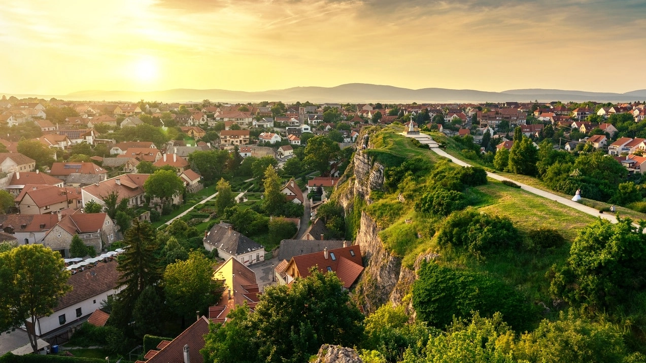 The green hill garden in the middle of old town Veszprem, Hungary at sunset