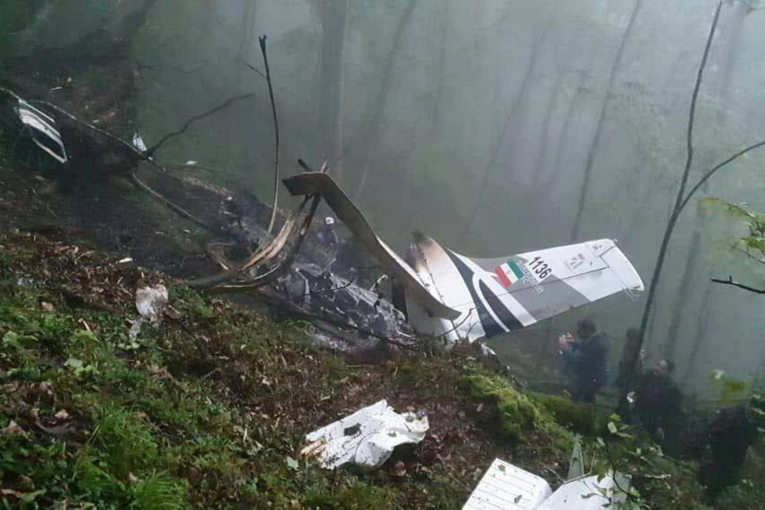 I resti dell'elicottero precipitato con a bordo il presidente dell'Iran, Raisi (Epa)