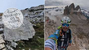 Tre Cime di Lavaredo, una scritta sfregia il masso dei dinosauri. Moreno Pesce: “Così ho scoperto lo scempio”