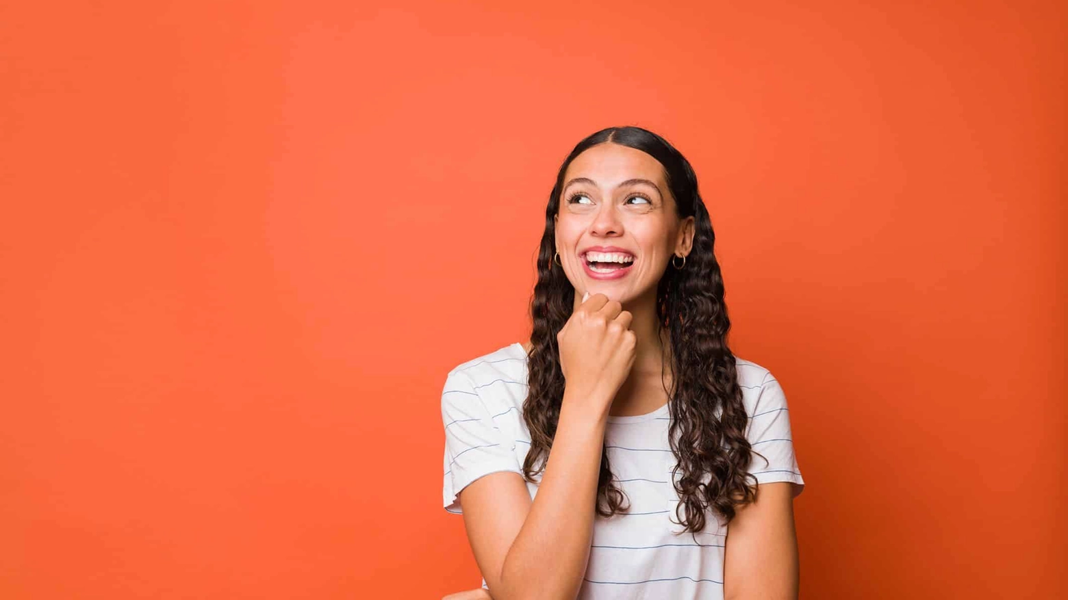 Smiling woman dreaming about the future