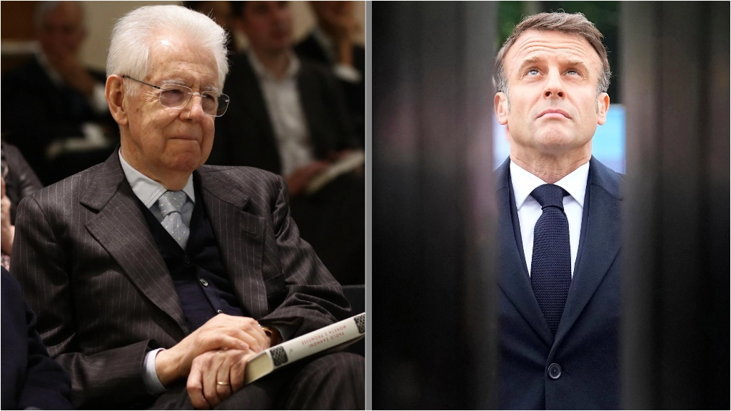 Mario Monti e Emmanuel Macron (foto Ansa)