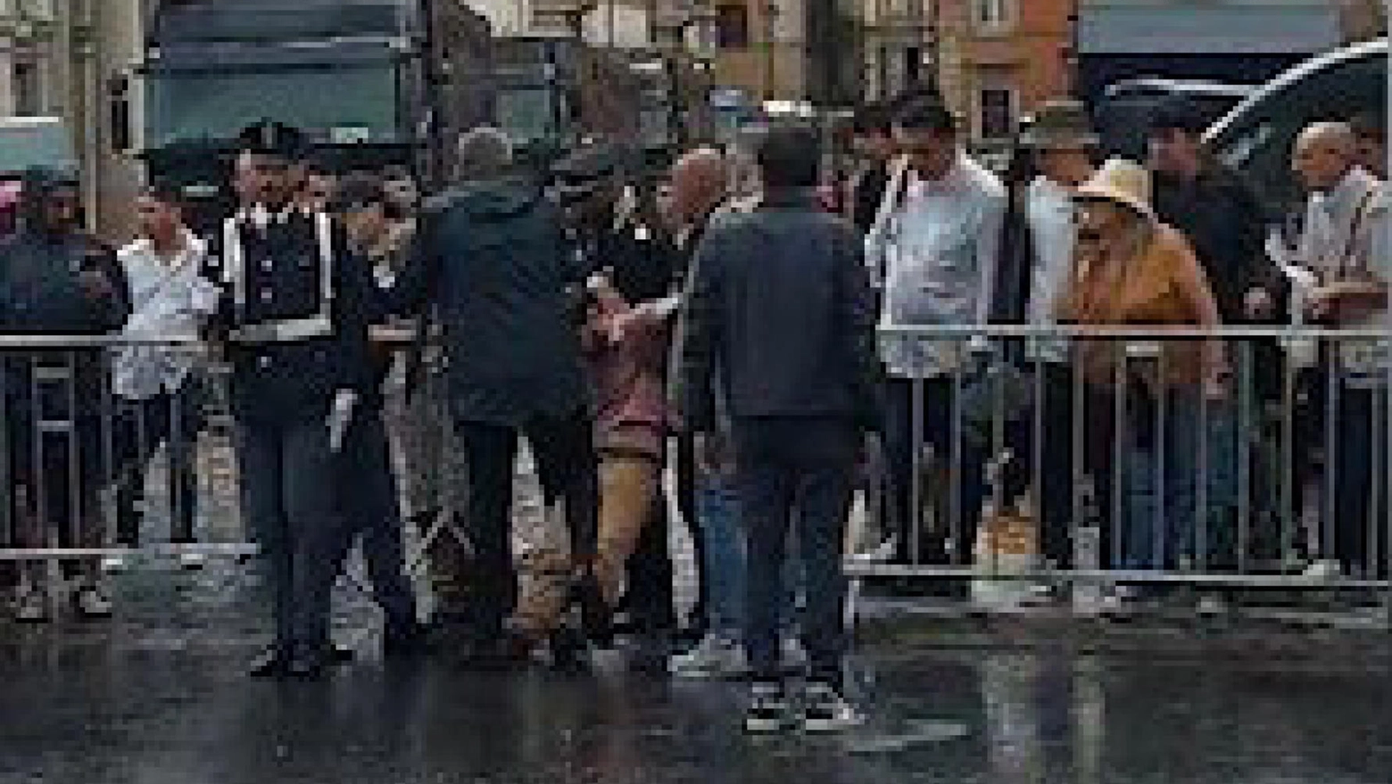 Uno degli attivisti di Ultima Generazione bloccato a Roma prima della parata del 2 Giugno (Ansa)