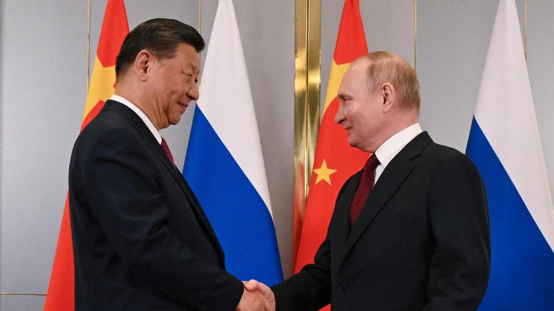 Xi e Putin a Kim, 