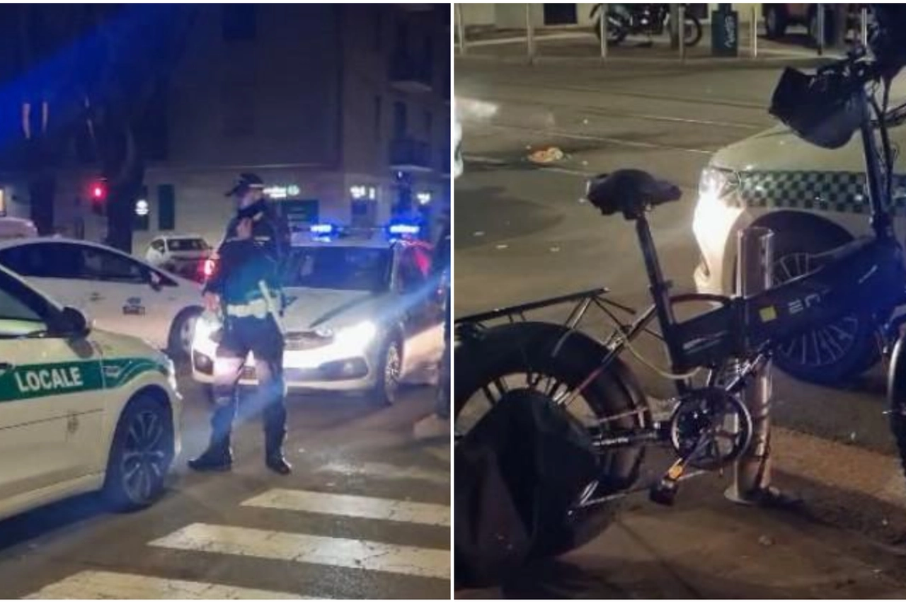 I rilievi della polizia locale e la bici elettrica della vittima (Fasani-Ansa)