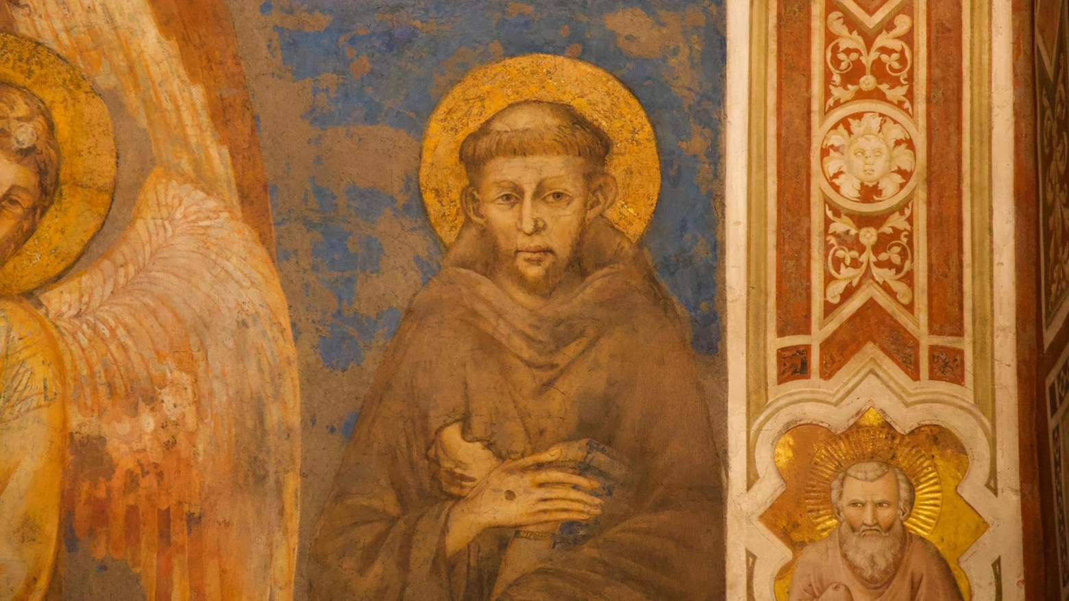 San Francesco di Assisi in un affresco (Ansa Foto)