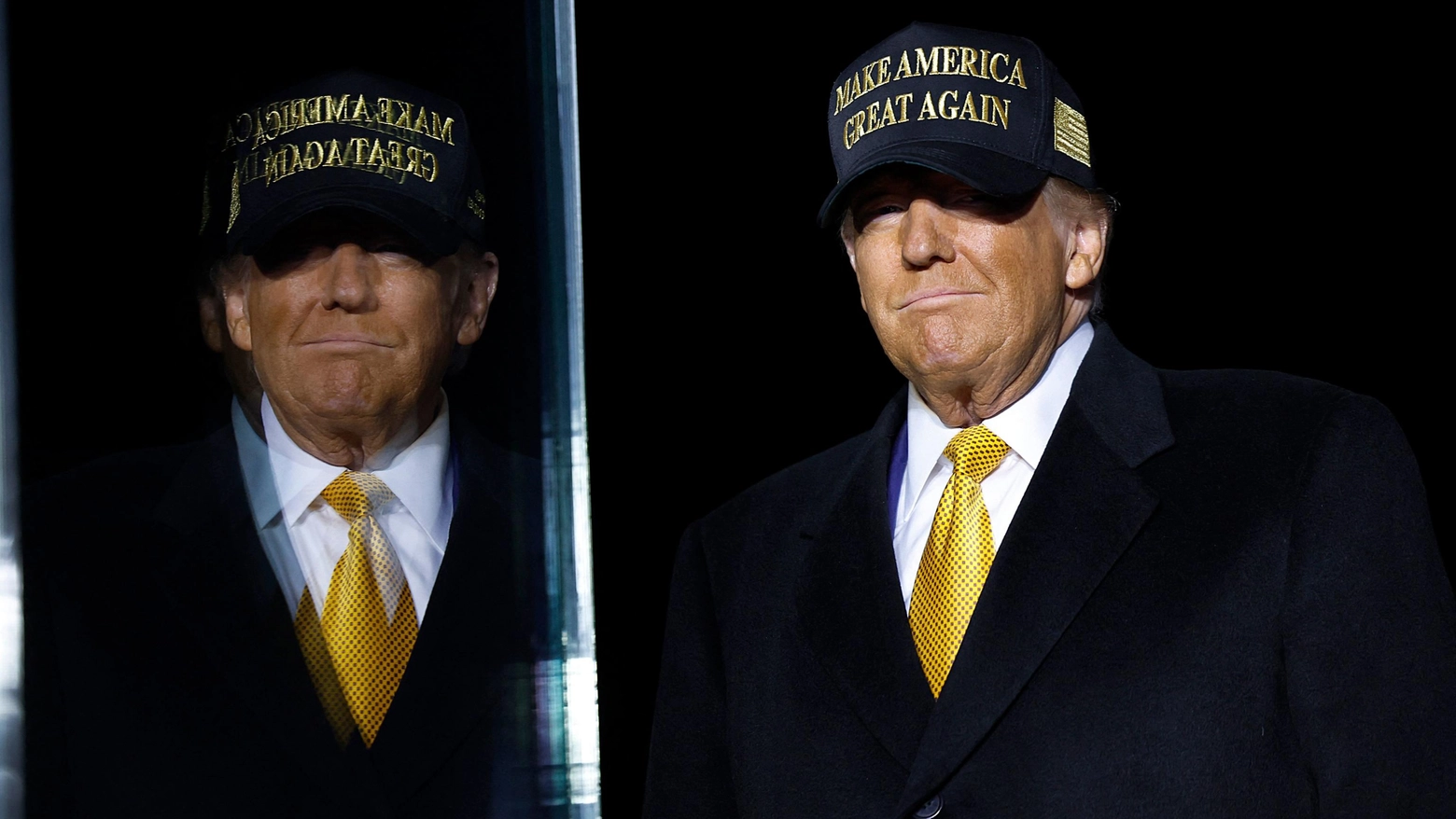 L'ex presidente Donald Trump al suo arrivo in Michigan (Getty Images via AFP)